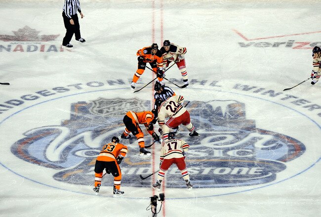 PHILADELPHIA, PA - JANUARY 02:  The Philadelphia Flyers take on the New York Rangers during the 2012 Bridgestone NHL Winter Classic at Citizens Bank Park on January 2, 2012 in Philadelphia, Pennsylvania.  (Photo by Patrick McDermott/Getty Images)