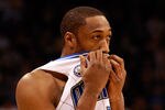 ORLANDO, FL - FEBRUARY 13:  Gilbert Arenas #1 of the Orlando Magic covers his mouth during the game against the Los Angeles Lakers at Amway Arena on February 13, 2011 in Orlando, Florida.  NOTE TO USER: User expressly acknowledges and agrees that, by downloading and or using this Photograph, user is consenting to the terms and conditions of the Getty Images License Agreement.  (Photo by Sam Greenwood/Getty Images)