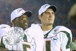 3 Jan 2002:   University of Miami quarterback Ken Dorsey #11 and running back Andre Johnson #5, named co MVP's, stand on the victory podium after the Rose Bowl National Championship Game versus Nebraska at the Rose Bowl in Pasadena, California.  Miami won 37-14.  DIGITAL IMAGE    Mandatory Credit:  Stephen Dunn/Getty Images