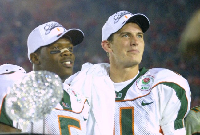 3 Jan 2002:   University of Miami quarterback Ken Dorsey #11 and running back Andre Johnson #5, named co MVP's, stand on the victory podium after the Rose Bowl National Championship Game versus Nebraska at the Rose Bowl in Pasadena, California.  Miami won 37-14.  DIGITAL IMAGE    Mandatory Credit:  Stephen Dunn/Getty Images