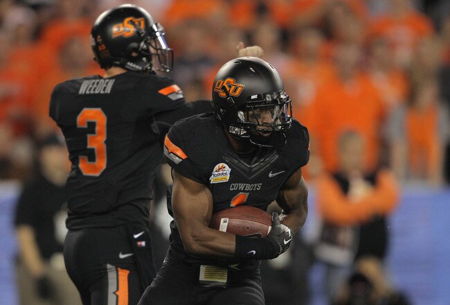 GLENDALE, AZ - JANUARY 02:  Joseph Randle #1 of the Oklahoma State Cowboys runs the ball against the Stanford Cardinal during the Tostitos Fiesta Bowl on January 2, 2012 at University of Phoenix Stadium in Glendale, Arizona.  (Photo by Doug Pensinger/Getty Images)