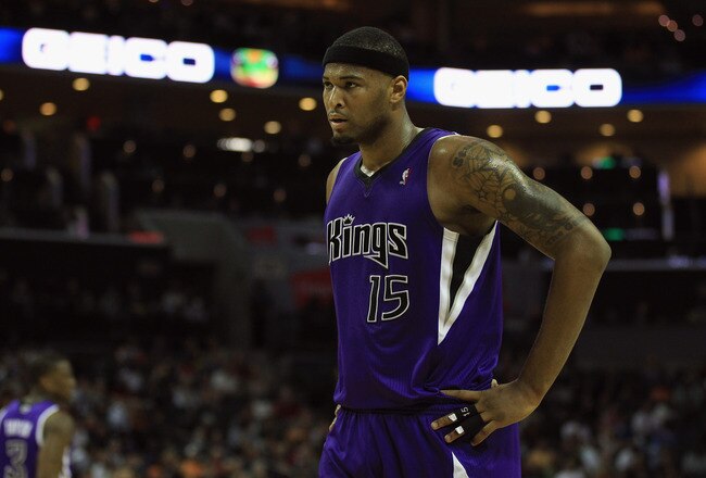 CHARLOTTE, NC - FEBRUARY 25:  DeMarcus Cousins #15 of the Sacramento Kings reacts to a call against the Charlotte Bobcats during their game at Time Warner Cable Arena on February 25, 2011 in Charlotte, North Carolina. NOTE TO USER: User expressly acknowledges and agrees that, by downloading and/or using this Photograph, User is consenting to the terms and conditions of the Getty Images License Agreement.  (Photo by Streeter Lecka/Getty Images)