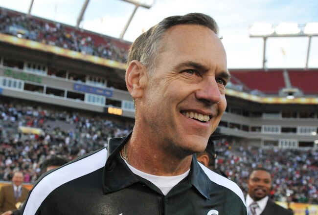 TMAPA, FL - JANUARY 02: Coach Mark Dantonio of the Michigan State Spartans smiles after a 33 - 30 victory against the Georgia Bulldogs in the Outback Bowl January 2, 2012 at Raymond James Stadium, Tampa Florida. (Photo by Al Messerschmidt/Getty Images)