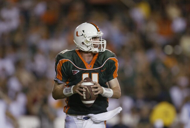 MIAMI - SEPTEMBER 21:  Quarterback Ken Dorsey #11 of the Miami Hurricanes looks to pass during the Big East Conference football game against the Boston College Eagles on September 21, 2002 at the Orange Bowl in Miami, Florida.  Miami won 38-6. (Photo by Andy Lyons/Getty Images)