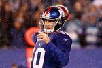EAST RUTHERFORD, NJ - JANUARY 01:   Eli Manning #10 of the New York Giants looks to pass against the Dallas Cowboys at MetLife Stadium on January 1, 2012 in East Rutherford, New Jersey.  (Photo by Jeff Zelevansky/Getty Images)