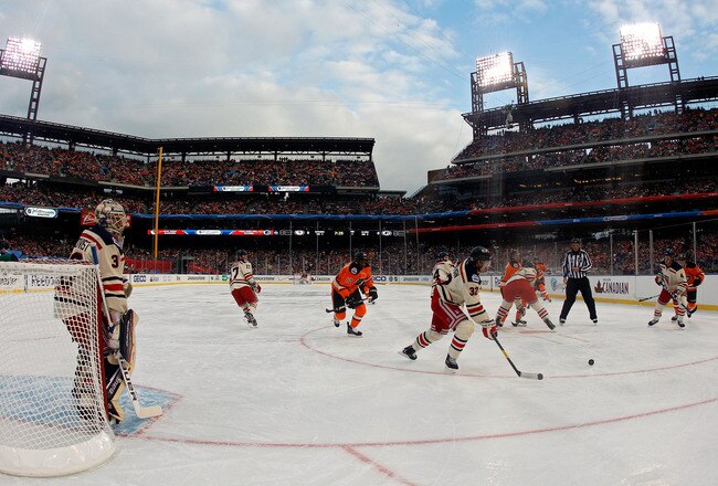 PHILADELPHIA, PA - JANUARY 02:  Anton Stralman #32 of the New York Rangers handles the puck against the Philadelphia Flyers during the 2012 Bridgestone NHL Winter Classic at Citizens Bank Park on January 2, 2012 in Philadelphia, Pennsylvania.  (Photo by Rob Carr/Getty Images)