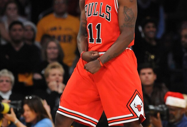 LOS ANGELES, CA - DECEMBER 25:  Ronnie Brewer #11 of the Chicago Bulls celebrates defeating the Los Angeles Lakers 88-87 at Staples Center on December 25, 2011 in Los Angeles, California.  NOTE TO USER: User expressly acknowledges and agrees that, by downloading and or using this photograph, User is consenting to the terms and conditions of the Getty Images License Agreement.  (Photo by Lisa Blumenfeld/Getty Images)
