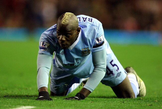 LIVERPOOL, ENGLAND - NOVEMBER 27:  Mario Balotelli of Manchester City looks on during the Barclays Premier League match between Liverpool and Manchester City at Anfield on November 27, 2011 in Liverpool, England.  (Photo by Alex Livesey/Getty Images)