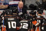 WINNIPEG, CANADA - DECEMBER 17: Anaheim Ducks' head coach Bruce Boudreau speaks to his team at the bench in a game against the Winnipeg Jets in NHL action at the MTS Centre on December 17, 2011 in Winnipeg, Manitoba, Canada. (Photo by Marianne Helm/Getty Images)