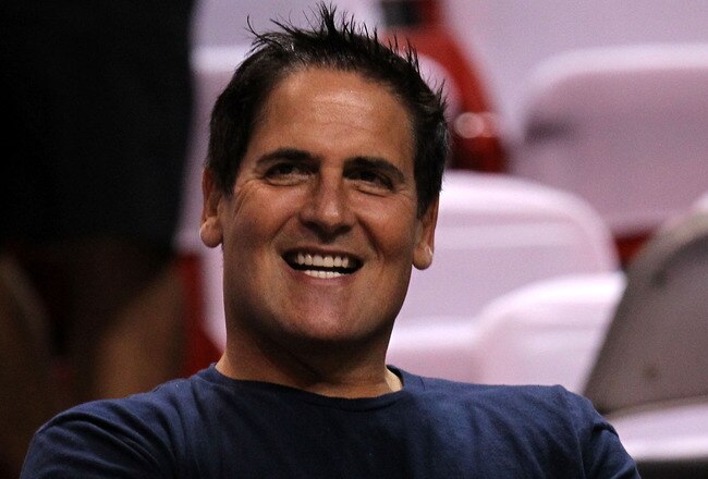 MIAMI, FL - JUNE 12:  Owner Mark Cuban of the Dallas Mavericks smiles as he sits courtside before Game Six of the 2011 NBA Finals against the Miami Heat at American Airlines Arena on June 12, 2011 in Miami, Florida. NOTE TO USER: User expressly acknowledges and agrees that, by downloading and/or using this Photograph, user is consenting to the terms and conditions of the Getty Images License Agreement.  (Photo by Ronald Martinez/Getty Images)