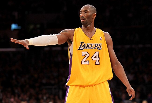 LOS ANGELES, CA - DECEMBER 27:  Kobe Bryant #24 of the Los Angeles Lakers gestures during the game against the Utah Jazz at Staples Center on December 27, 2011 in Los Angeles, California.  The Lakers won 96-71. NOTE TO USER: User expressly acknowledges and agrees that, by downloading and or using this photograph, User is consenting to the terms and conditions of the Getty Images License Agreement.  (Photo by Stephen Dunn/Getty Images)
