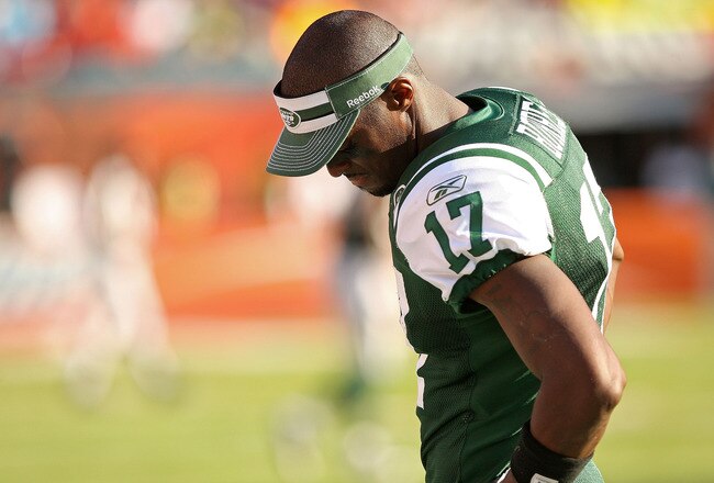 MIAMI GARDENS, FL - JANUARY 01:  Plaxico Burress #17 of the New York Jets looks on during a game against the Miami Dolphins at Sun Life Stadium on January 1, 2012 in Miami Gardens, Florida.  (Photo by Mike Ehrmann/Getty Images)
