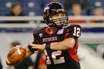 DETROIT, MI - DECEMBER 02:  Chandler Harnish #12 of the Northern Illinois Huskies throws a pass in the first quarter of the MAC Championship game against the Ohio Bobcats at Ford Field on December 2, 2011 in Detroit, Michigan. The Huskies defeated the Bobcats 23-20.  (Photo by Mark A. Cunningham/Getty Images)