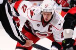 OTTAWA, ON - NOVEMBER 27:  Eric Staal #12 of the Carolina Hurricanes watches intently at a faceoff  in a game against the Ottawa Senators at Scotiabank Place on November 27, 2011 in Ottawa, Canada.  (Photo by Phillip MacCallum/Getty Images)