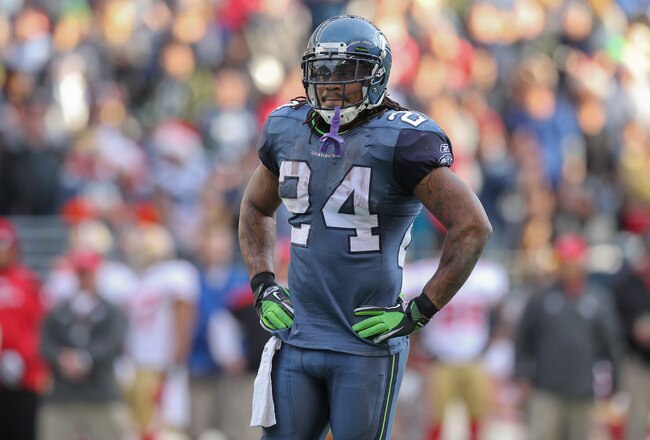 SEATTLE - DECEMBER 24:  Running back Marshawn Lynch #24 of the Seattle Seahawks looks on during the game against the San Francisco 49ers at CenturyLink Field on December 24, 2011 in Seattle, Washington. (Photo by Otto Greule Jr/Getty Images)