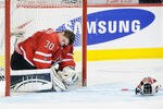 CALGARY, CANADA - JANUARY 3:  Scott Wedgewood #30 of Team Canada injured in his net after a collision with Nikita Kucherov #9 of Team Russia (not pictured) during the 2012 World Junior Hockey Championship Semifinal game at the Saddledome on January 3, 2012 in Calgary, Alberta, Canada.  (Photo by Richard Wolowicz/Getty Images)