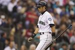 SEATTLE, WA - SEPTEMBER 17: Ichiro Suzuki #51 of the Seattle Mariners walks off the field after striking out during a game against the Texas Rangers at Safeco Field on September 17, 2011 in Seattle, Washington. (Photo by Stephen Brashear/Getty Images)