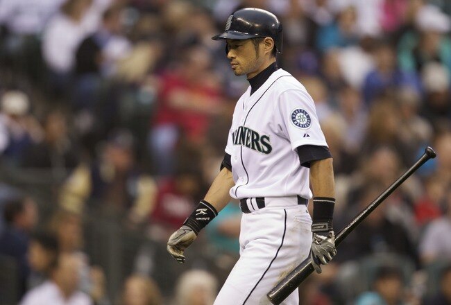 SEATTLE, WA - SEPTEMBER 17: Ichiro Suzuki #51 of the Seattle Mariners walks off the field after striking out during a game against the Texas Rangers at Safeco Field on September 17, 2011 in Seattle, Washington. (Photo by Stephen Brashear/Getty Images)