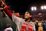 ST LOUIS, MO - OCTOBER 28:  World Series MVP David Freese #23 of the St. Louis Cardinals celebrates with fans after defeating the Texas Rangers 6-2 to win Game Seven of the MLB World Series at Busch Stadium on October 28, 2011 in St Louis, Missouri.  (Photo by Dilip Vishwanat/Getty Images)