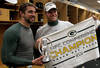 CHICAGO, IL - JANUARY 23:  (L-R) Quarterback Aaron Rodgers #12 and Matt Flynn #10 of the Green Bay Packers celebrate the Packers 21-14 victory against the Chicago Bears with the George Halas Trophy after the NFC Championship Game at Soldier Field on January 23, 2011 in Chicago, Illinois.  (Photo by Jonathan Daniel/Getty Images)