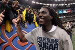NEW ORLEANS, LA - JANUARY 03:  Denard Robinson #16 of the Michigan Wolverines celebrates as he runs off of the field after Michigan won 23-20 in overtime against Virginia Tech Hokies during the Allstate Sugar Bowl at Mercedes-Benz Superdome on January 3, 2012 in New Orleans, Louisiana.  (Photo by Chris Graythen/Getty Images)