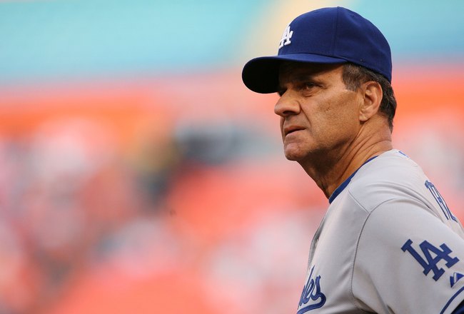 MIAMI - APRIL 09:  Manager Joe Torre #6 of the Los Angeles Dodgers looks around from the field before taking on the Florida Marlins during the Marlins home opening game at Sun Life Stadium on April 9, 2010 in Miami, Florida. The Dodgers defeated the Marlins 7-3.  (Photo by Doug Benc/Getty Images)