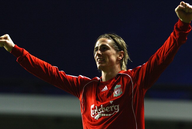 LIVERPOOL, UNITED KINGDOM - DECEMBER 22:  Fernando Torres of Liverpool celebrates scoring his team's third goal during the Barclays Premier League match between Liverpool and Portsmouth at Anfield on December 22, 2007 in Liverpool, England.  (Photo by Laurence Griffiths/Getty Images)