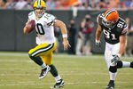CLEVELAND, OH - AUGUST 13: Brian Schaefering #91 of the Cleveland Browns pursues Matt Flynn #10 of the Green Bay Packers during the second quarter at Cleveland Browns Stadium on August 13, 2011 in Cleveland, Ohio. The Browns defeated the Packers 27-17. (Photo by Jason Miller/Getty Images)