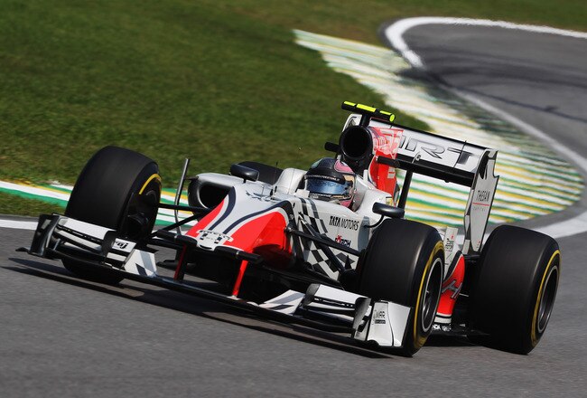 SAO PAULO, BRAZIL - NOVEMBER 25:  Vitantonio Liuzzi of Italy and Hispania Racing Team drives during practice for the Brazilian Formula One Grand Prix at the Autodromo Jose Carlos Pace on November 25, 2011 in Sao Paulo, Brazil.  (Photo by Mark Thompson/Getty Images)