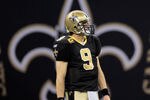 NEW ORLEANS, LA - JANUARY 01:  Drew Brees #9 of the New Orleans Saints stands on the field during the game against the Carolina Panthers at the Mercedes-Benz Superdome on January 1, 2012 in New Orleans, Louisiana.  (Photo by Chris Graythen/Getty Images)