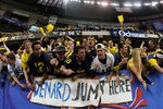 NEW ORLEANS, LA - JANUARY 03:  Fans of the Michigan Wolverines celebrate afer Michigan won 23-20 in overtime against the Virginia Tech Hokies during the Allstate Sugar Bowl at Mercedes-Benz Superdome on January 3, 2012 in New Orleans, Louisiana.  (Photo by Kevin C. Cox/Getty Images)