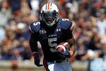AUBURN, AL - SEPTEMBER 10:  Running back Michael Dyer #5 of the Auburn Tigers runs for a first down against the Mississippi State Bulldogs in the first half on September 10, 2011 at Jordan-Hare Stadium in Auburn, Alabama. (Photo by Butch Dill/Getty Images)