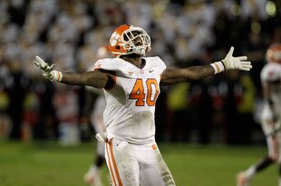 COLLEGE PARK, MD - OCTOBER 15:  Defensive end Andre Branch #40 of the Clemson Tigers celebrates during the closing moments of the Tigers 56-45 win over the Maryland Terrapins at Byrd Stadium on October 15, 2011 in College Park, Maryland. The Clemson won 56-45.  (Photo by Rob Carr/Getty Images)