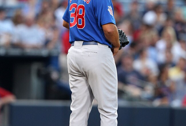 ATLANTA, GA - AUGUST 12:  Pitcher Carlos Zambrano #38 of the Chicago Cubs looks to first base during the game against the Atlanta Braves at Turner Field on August 12, 2011 in Atlanta, Georgia.  (Photo by Mike Zarrilli/Getty Images)