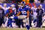 EAST RUTHERFORD, NJ - JANUARY 01:  Victor Cruz #80 of the New York Giants reacts after making a catch against the Dallas Cowboys in the fourth quarter at MetLife Stadium on January 1, 2012 in East Rutherford, New Jersey.  (Photo by Al Bello/Getty Images)
