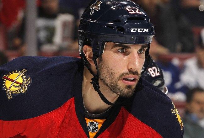 SUNRISE, FL - DECEMBER 27: Jason Garrison #52 of the Florida Panthers prepares for a face off against the Toronto Maple Leafs on December 27, 2011 at the BankAtlantic Center in Sunrise, Florida. The Panthers defeated the Maple Leafs 5-3. (Photo by Joel Auerbach/Getty Images)