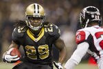 NEW ORLEANS, LA - DECEMBER 26:   Chris Ivory #29 of the New Orleans Saints runs the ball against the Atlanta Falcons at Mercedes-Benz Superdome on December 26, 2011 in New Orleans, Louisiana.  The Saints defeated the Falcons 45-16.  (Photo by Wesley Hitt/Getty Images)