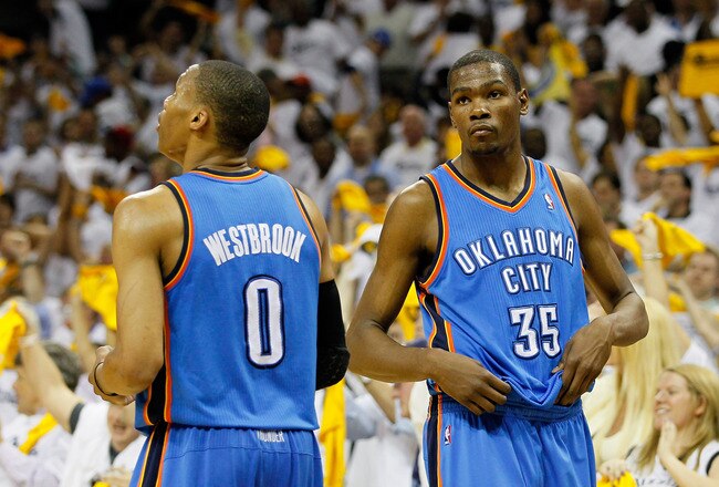 MEMPHIS, TN - MAY 13:  Russell Westbrook #0 and Kevin Durant #35 of the Oklahoma City Thunder react after their 95-83 loss to the Memphis Grizzlies in Game Six of the Western Conference Semifinals in the 2011 NBA Playoffs at FedExForum on May 13, 2011 in Memphis, Tennessee.  NOTE TO USER: User expressly acknowledges and agrees that, by downloading and/or using this photograph, User is consenting to the terms and conditions of the Getty Images License Agreement.  (Photo by Kevin C. Cox/Getty Images)