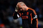 MANCHESTER, ENGLAND - JANUARY 03:  Pepe Reina of Liverpool looks dejected during the Barclays Premier League match between Manchester City and Liverpool at the Etihad Stadium on January 3, 2012 in Manchester, England.  (Photo by Clive Brunskill/Getty Images)