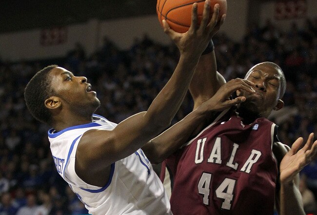 LEXINGTON, KY - JANUARY 03:  Michel Kidd-Gilchrist #14 of the Kentucky Wildcats shoots the ball while defended by Michael Javes #44 of the Arkansas-Little Rock Trojans during the game at Freedom Hall on January 3, 2012 in Louisville , Kentucky.  (Photo by Andy Lyons/Getty Images)