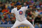 CHICAGO - MAY 12: Starting pitcher Carlos Silva #52 of the Chicago Cubs delivers the ball against the Florida Marlins at Wrigley Field on May 12, 2010 in Chicago, Illinois. The Cubs defeated the Marlins 4-3.  (Photo by Jonathan Daniel/Getty Images)