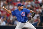 ATLANTA, GA - AUGUST 12:  Pitcher Carlos Zambrano #38 of the Chicago Cubs throws a pitch during the game against the Atlanta Braves at Turner Field on August 12, 2011 in Atlanta, Georgia.  (Photo by Mike Zarrilli/Getty Images)