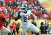 TMAPA, FL - JANUARY 02: Running back Le'Veon Bell #24 of the Michigan State Spartans rushes upfield against the Georgia Bulldogs in the Outback Bowl January 2, 2012 at Raymond James Stadium, Tampa Florida. The Spartans won 33 - 30. (Photo by Al Messerschmidt/Getty Images)