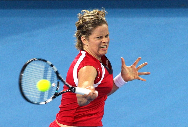 BRISBANE, AUSTRALIA - JANUARY 05:  Kim Clijsters of Belguim plays a forehand in her quarter final match against Iveta Benesova of the Czech Republic during day five of the 2012 Brisbane International at Pat Rafter Arena on January 5, 2012 in Brisbane, Australia.  (Photo by Bradley Kanaris/Getty Images)