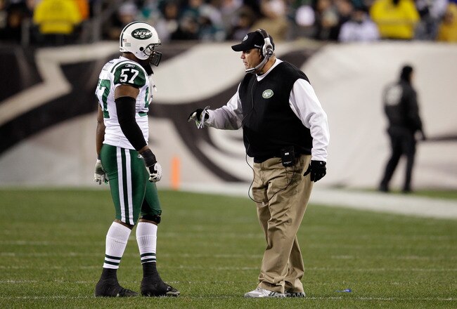 PHILADELPHIA, PA - DECEMBER 18:  Bart Scott #57 of the New York Jets talks with head coach Rex Ryan during the second half against the Philadelphia Eagles at Lincoln Financial Field on December 18, 2011 in Philadelphia, Pennsylvania.  (Photo by Rob Carr/Getty Images)