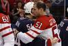 VANCOUVER, BC - FEBRUARY 28:  Bobby Ryan #54 of USA and Ryan Getzlaf #51 of Canada hug after the ice hockey men's gold medal game between USA and Canada on day 17 of the Vancouver 2010 Winter Olympics at Canada Hockey Place on February 28, 2010 in Vancouver, Canada. Canada defeated USA 3-2 in overtime. (Photo by Bruce Bennett/Getty Images)