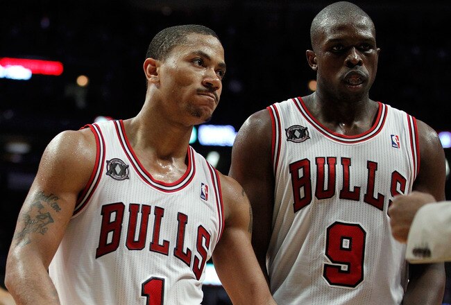 CHICAGO, IL - MAY 18: (L-R) Derrick Rose #1 and Luol Deng #9 of the Chicago Bulls look on dejected against the Miami Heat in Game Two of the Eastern Conference Finals during the 2011 NBA Playoffs on May 18, 2011 at the United Center in Chicago, Illinois. NOTE TO USER: User expressly acknowledges and agrees that, by downloading and or using this photograph, User is consenting to the terms and conditions of the Getty Images License Agreement.  (Photo by Gregory Shamus/Getty Images)