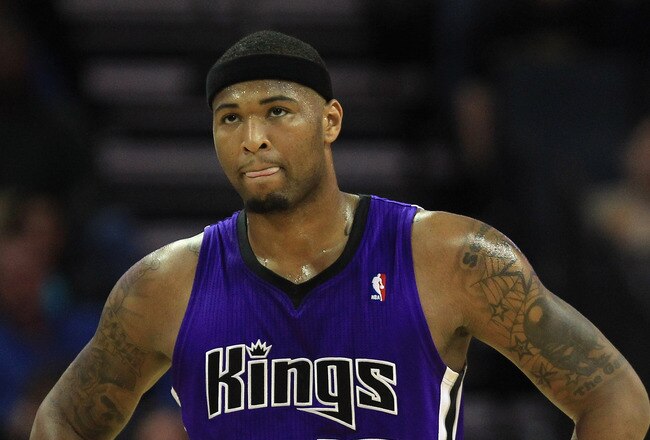 CHARLOTTE, NC - FEBRUARY 25:  DeMarcus Cousins #15 of the Sacramento Kings walks down the court against the Charlotte Bobcats during their game at Time Warner Cable Arena on February 25, 2011 in Charlotte, North Carolina. NOTE TO USER: User expressly acknowledges and agrees that, by downloading and/or using this Photograph, User is consenting to the terms and conditions of the Getty Images License Agreement.  (Photo by Streeter Lecka/Getty Images)