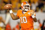 MIAMI GARDENS, FL - JANUARY 04:  Tajh Boyd #10 of the Clemson Tigers throws a pass against the West Virginia Mountaineers during the Discover Orange Bowl at Sun Life Stadium on January 4, 2012 in Miami Gardens, Florida.  (Photo by Mike Ehrmann/Getty Images)