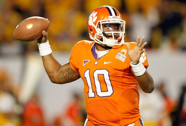 MIAMI GARDENS, FL - JANUARY 04:  Tajh Boyd #10 of the Clemson Tigers throws a pass against the West Virginia Mountaineers during the Discover Orange Bowl at Sun Life Stadium on January 4, 2012 in Miami Gardens, Florida.  (Photo by Mike Ehrmann/Getty Images)